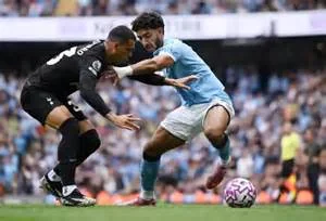Manchester City Beats Tottenham 2-1 – Title Race Tightens